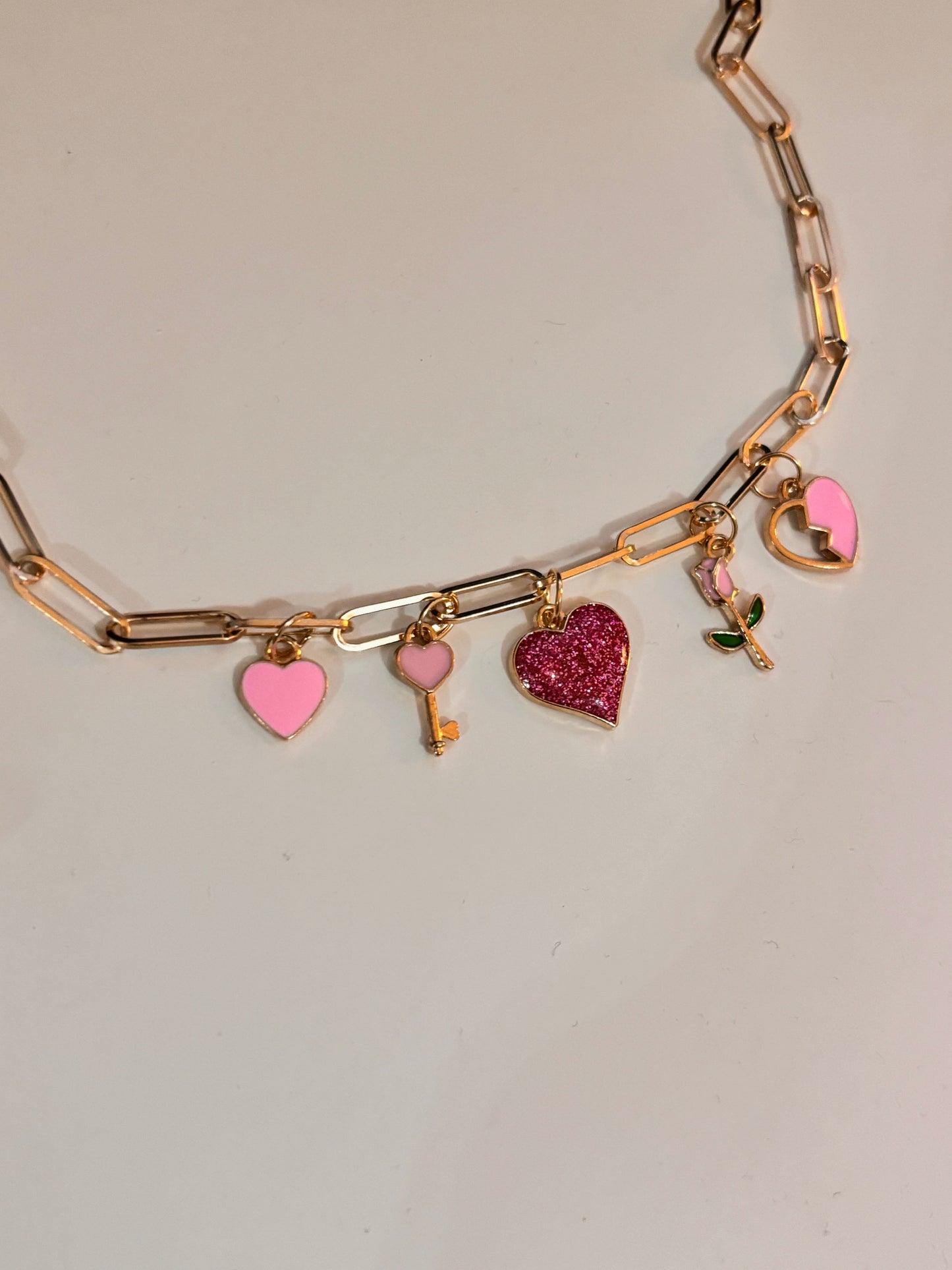 Pink charm necklace