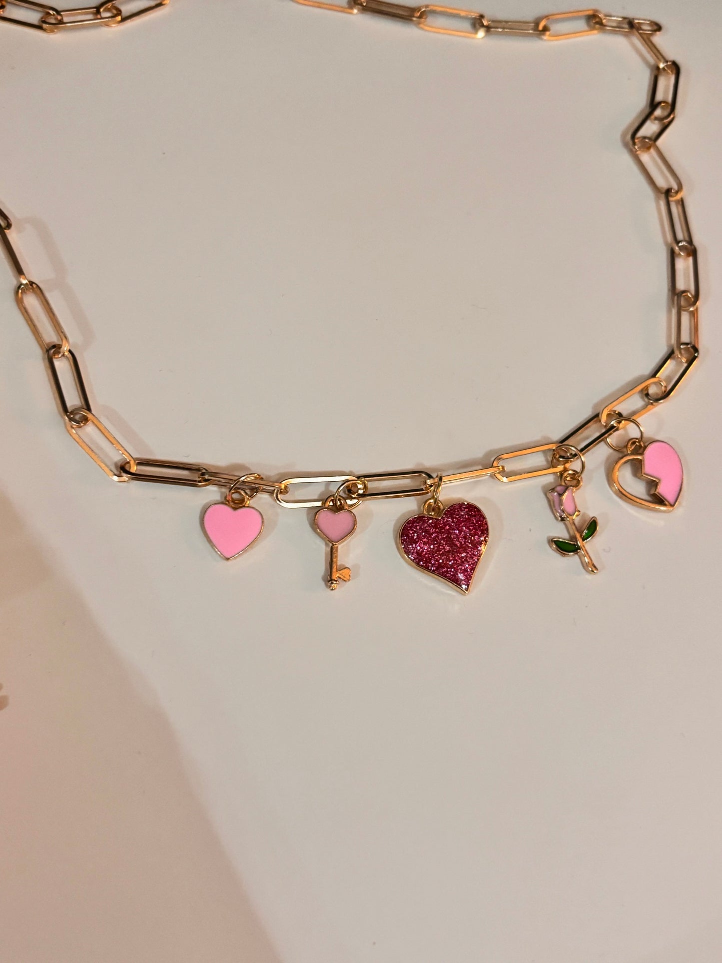 Pink charm necklace
